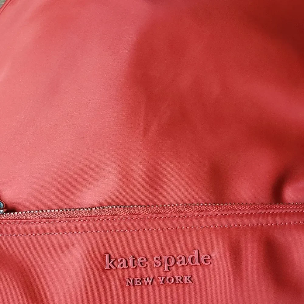 Kate Spade large orange nylon backpack
